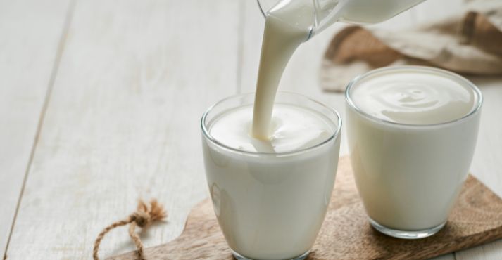 pouring buttermilk in glass