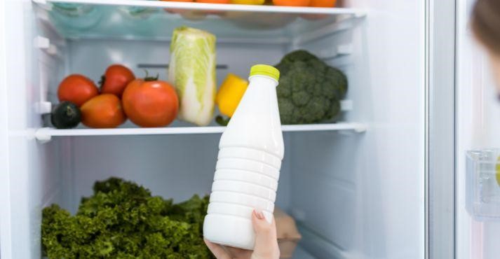 putting-Buttermilk-container-in-fridge