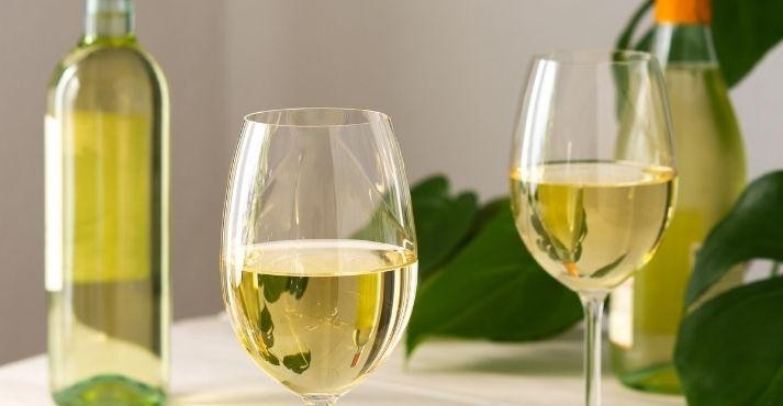 Chardonnay-wine-in-glass-and-bottles